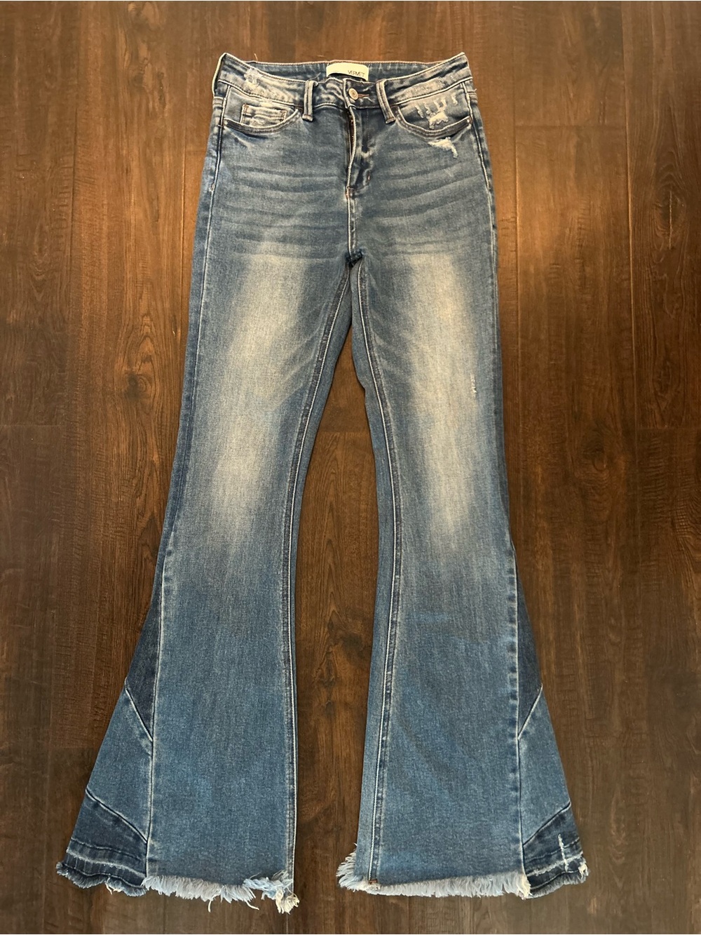 Blue Flare Jeans with Raw Hem Accent